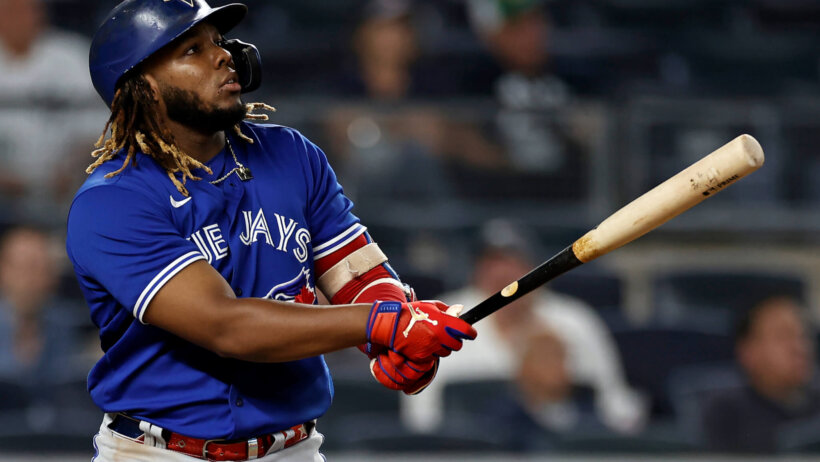 Vladimir Guerrero Jr admires a home run