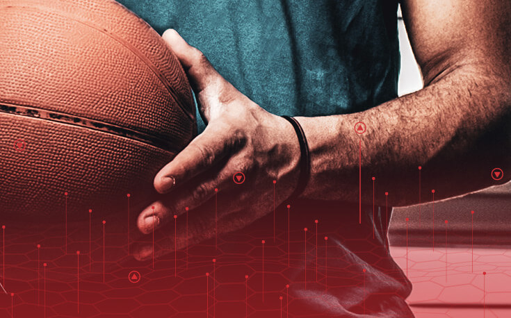 close up image of a basketball player holding a basketball