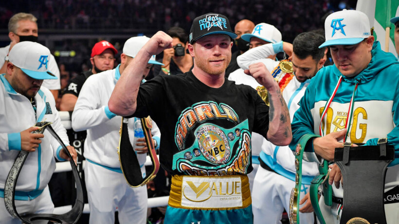 Canelo Alvarez celebrates victory