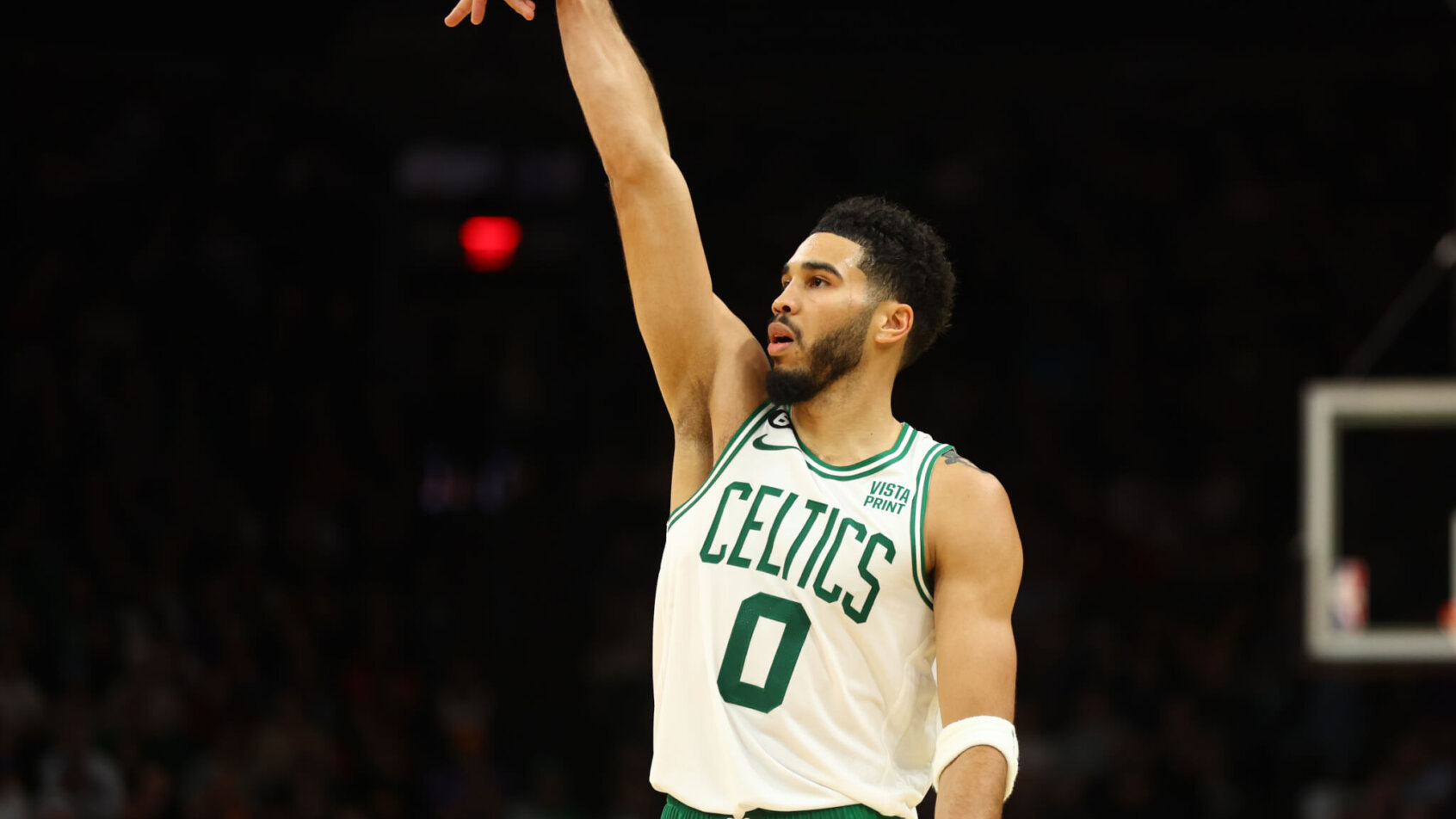 Jayson Tatum flicking wrist after shooting basketball