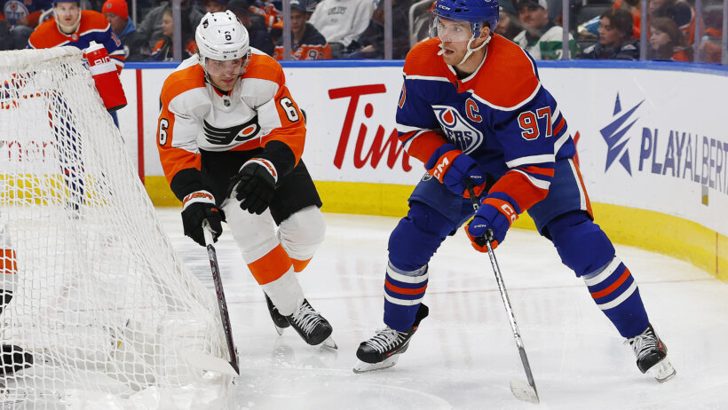 Edmonton Oilers forward Connor McDavid passes