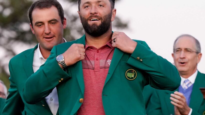 2022 Masters champion Scottie Scheffler puts the Green Jacket on 2023 winner Jon Rahm