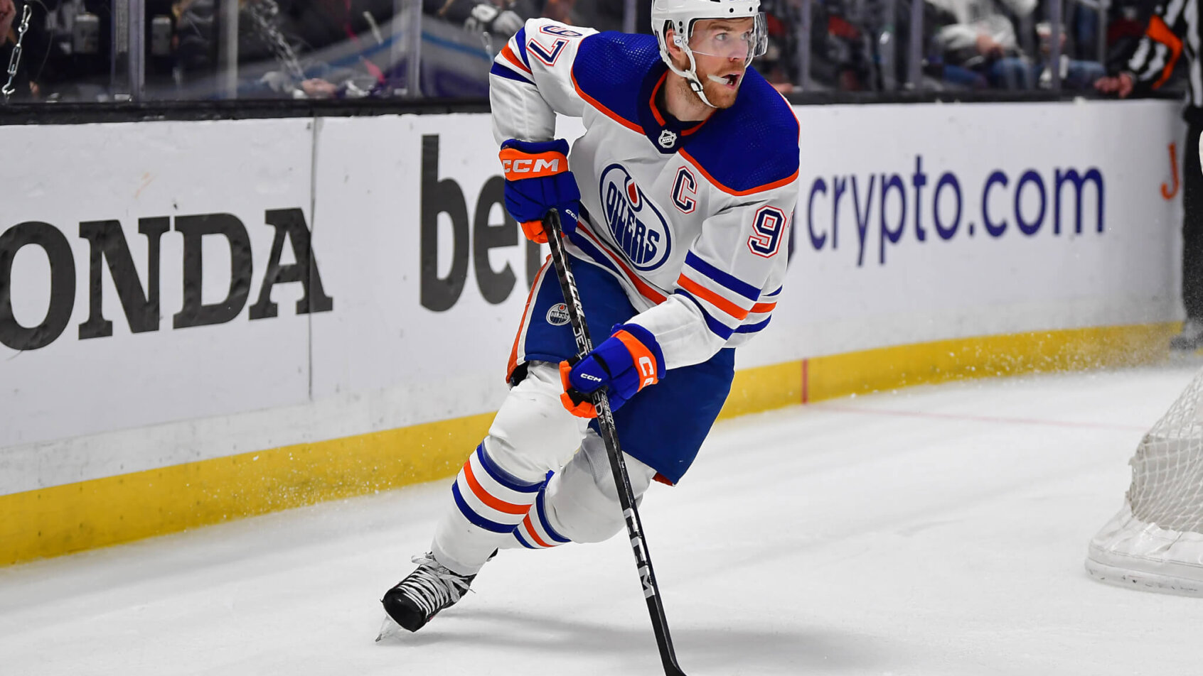 Edmonton Oilers center Connor McDavid moves the puck