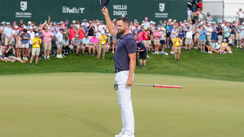 Wyndham Clark celebrates after winning the 2023 Wells Fargo Championship