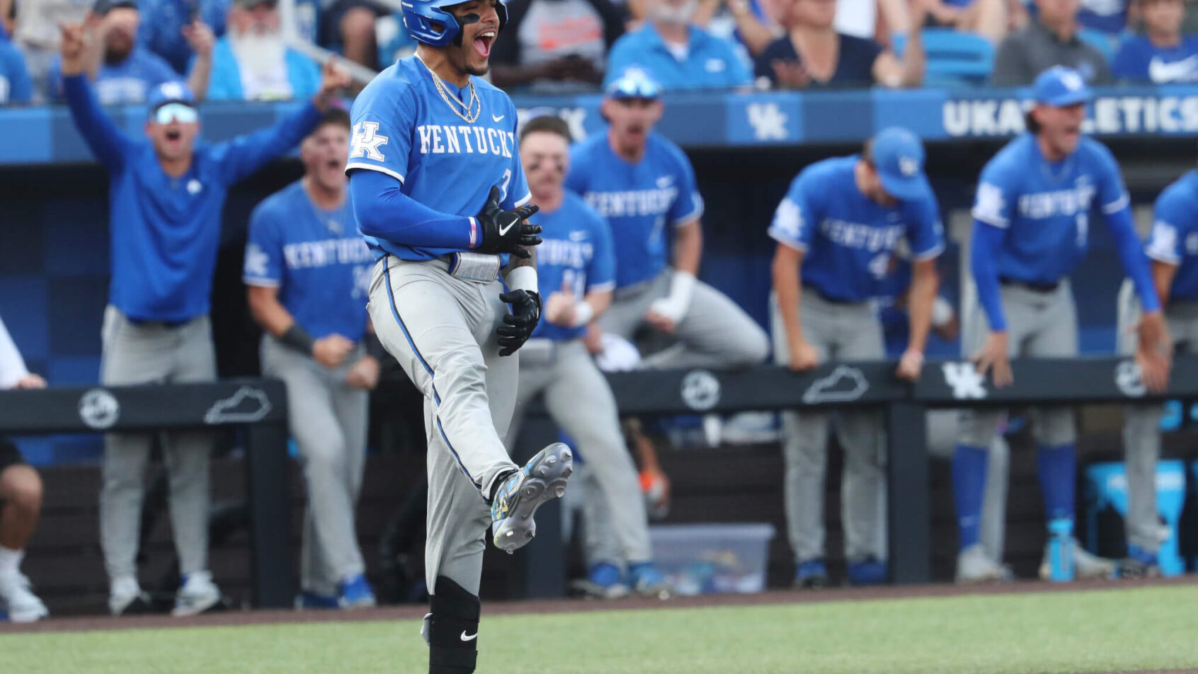 Kentucky Wildcats baseball player Devin Burkes celebrating blue jersey