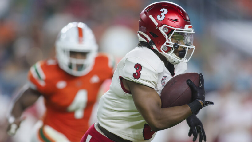 Miami Redhawks running back Keyon Mozee runs with the football