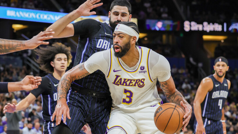 Los Angeles Lakers forward Anthony Davis backs down Orlando Magic center Goga Bitadze