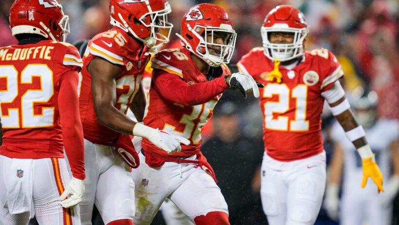 Kansas City Chiefs players celebrating red jerseys