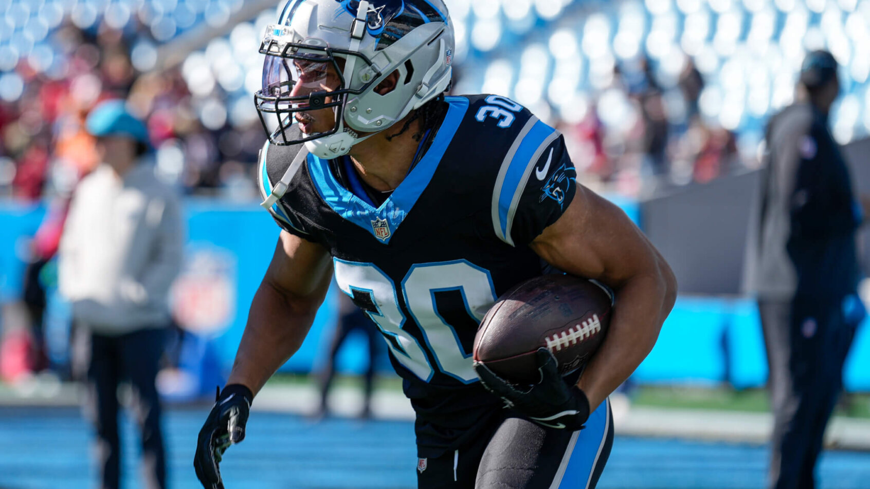 Carolina Panthers running back Chuba Hubbard warms up