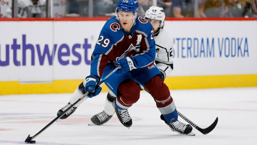 Colorado Avalanche center Nathan MacKinnon controls the puck