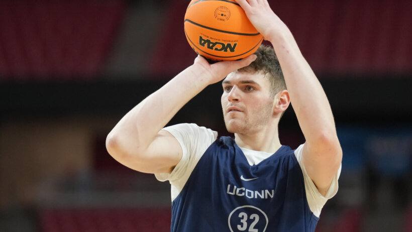 Donovan Clingan during practice before the 2024 March Madness Final Four