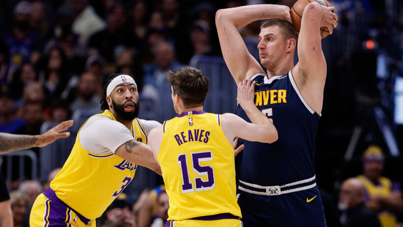 Denver Nuggets center Nikola Jokic controls the ball vs Lakers