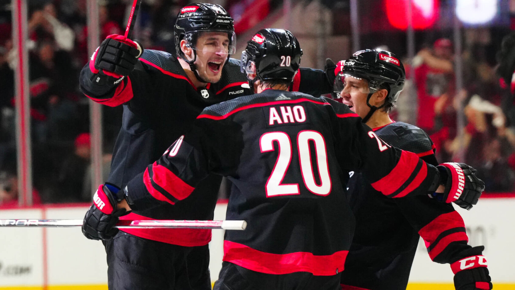 Carolina Hurricanes defenseman Brady Skjei celebrates his game-winning goal with teammates against the New York Rangers