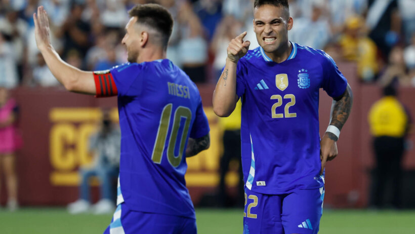 Argentina forwards Lautaro Martinez and Lionel Messi celebrate a goal against Guatemala