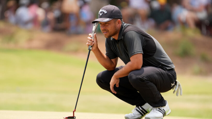 Xander Schauffele eyes a putt during the 2024 US Open in North Carolina.