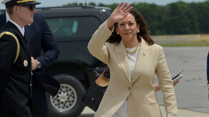 Vice President Kamala Harris waving to the press