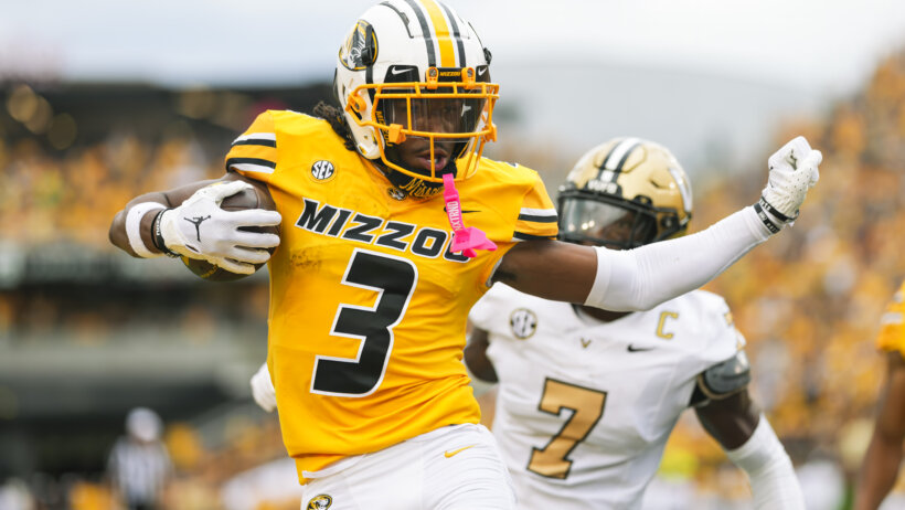 Missouri Tigers wide receiver Luther Burden III scores a touchdown