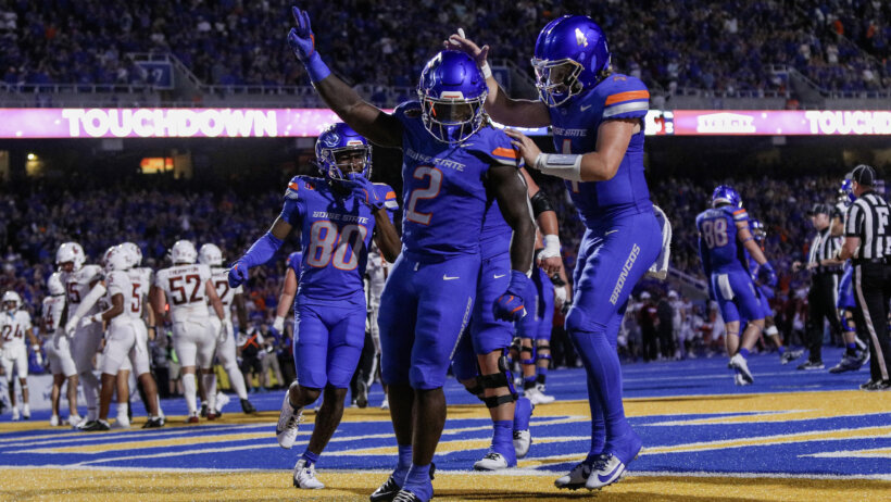 Boise State Broncos running back Ashton Jeanty and quarterback Maddux Madsen celebrate