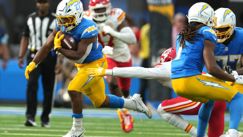 Los Angeles Chargers running back JK Dobbins runs the ball against the Kansas City Chiefs