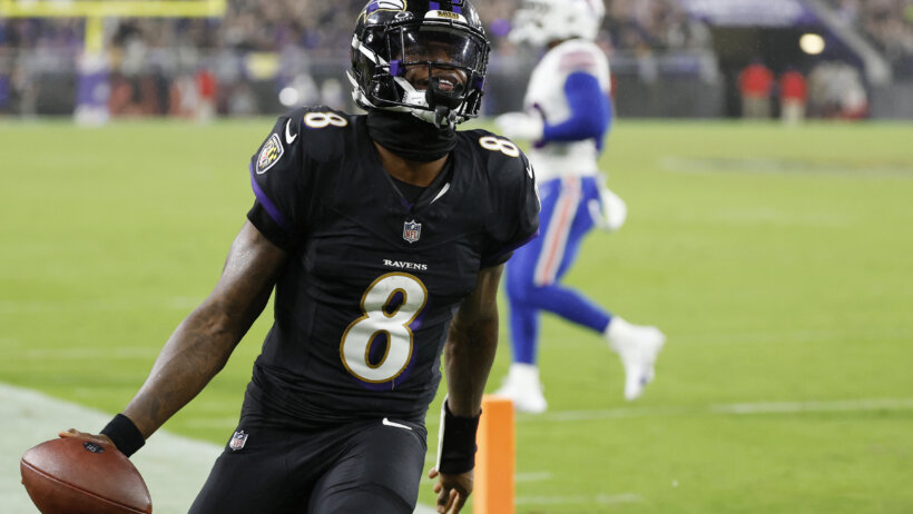 Lamar Jackson rushes for a TD versus the Bills.