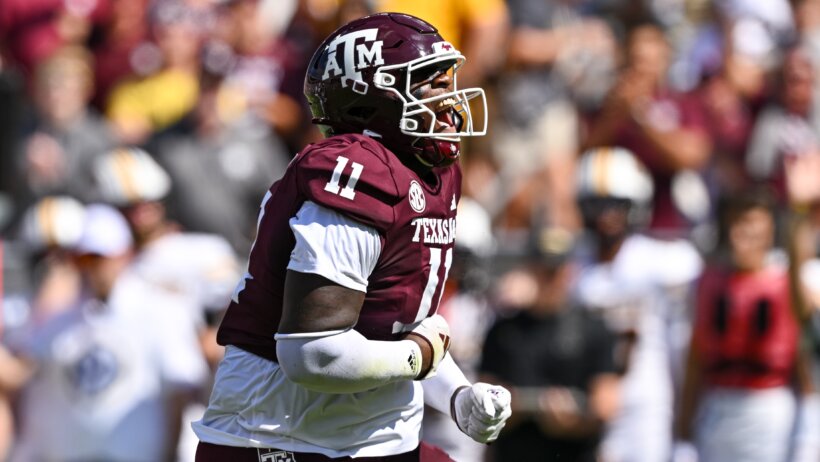 Texas A&M's Nic Scourton celebrating after a sack