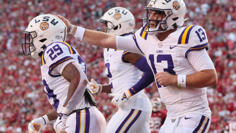 LSU Tigers quarterback Garrett Nussmeier celebrates after a rushing touchdown