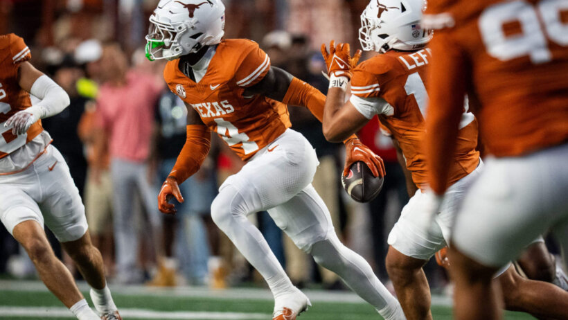 Texas Longhorns football players celebrating