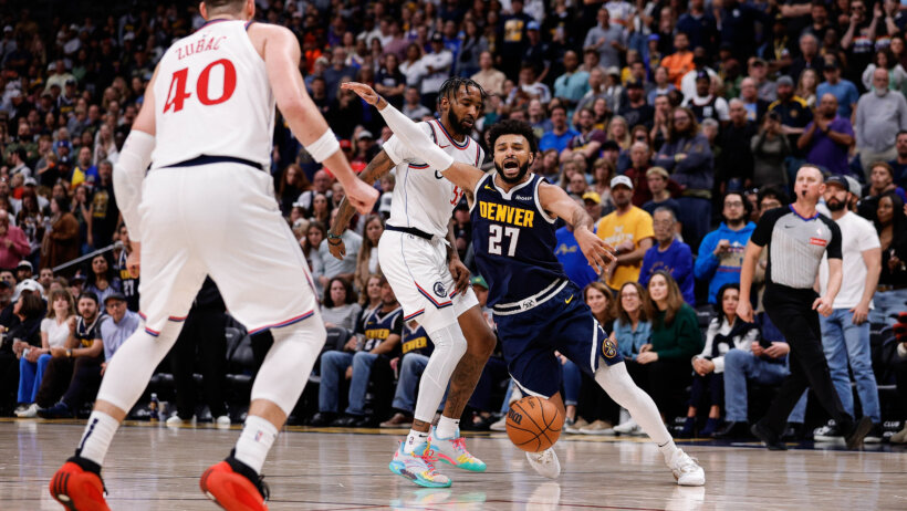 Denver Nuggets guard Jamal Murray getting fouled by Los Angeles Clippers forward Derrick Jones Jr