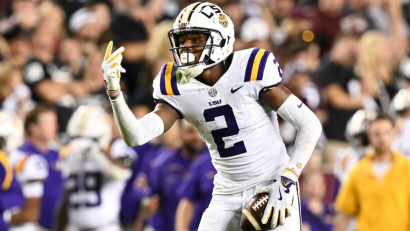 a LSU Tigers football player gesturing.