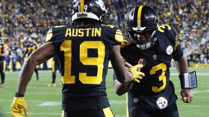 Russell Wilson and Calvin Austin III celebrate after a touchdown