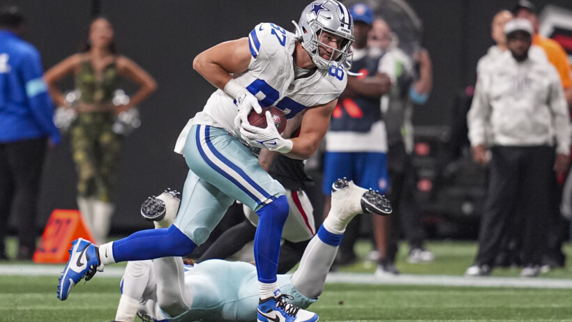 Dallas Cowboys tight end Jake Ferguson running with the ball