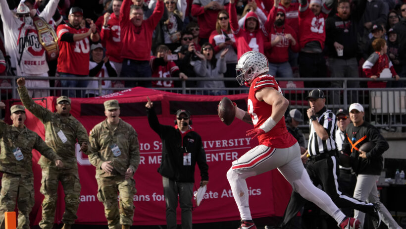 An Ohio State Buckeyes football scores a touchdown.