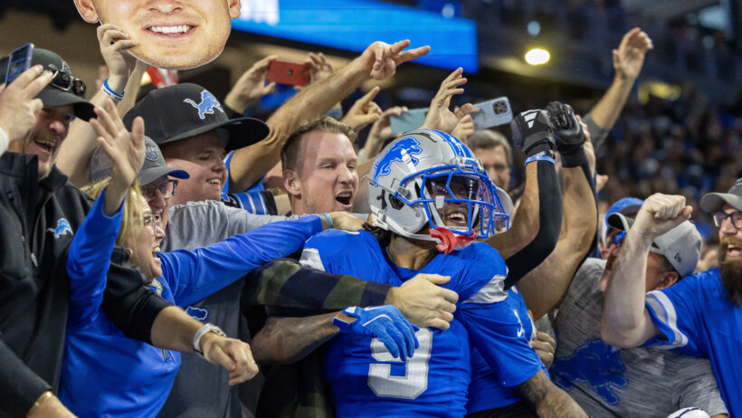 Jameson Williams celebrating with the crowd