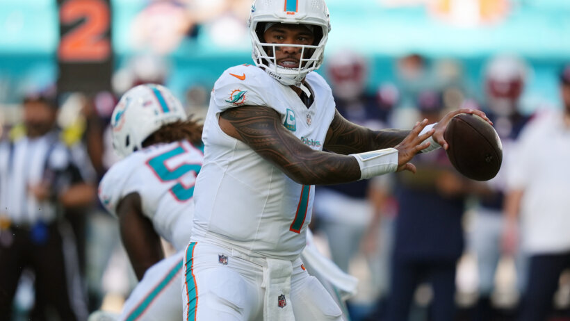 Miami Dolphins quarterback Tua Tagovailoa gets ready to throw a pass