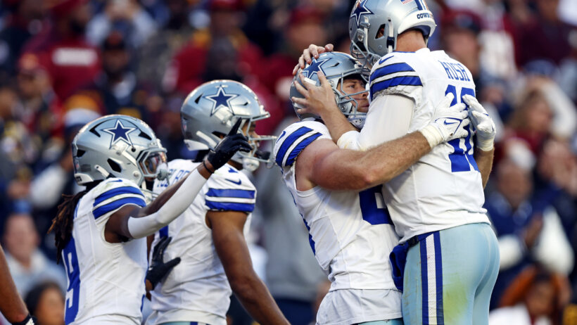 Dallas Cowboys tight end Luke Schoonmaker celebrates a TD with quarterback Cooper Rush