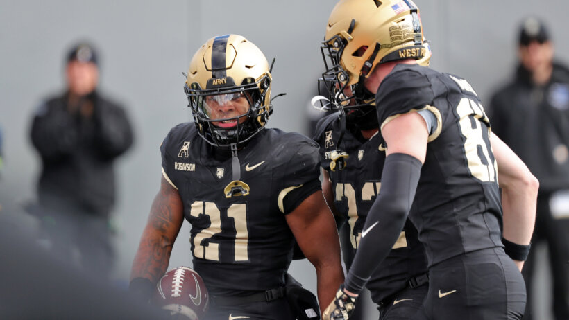 Army Black Knights running back Tyrell Robinson celebrates his touchdown