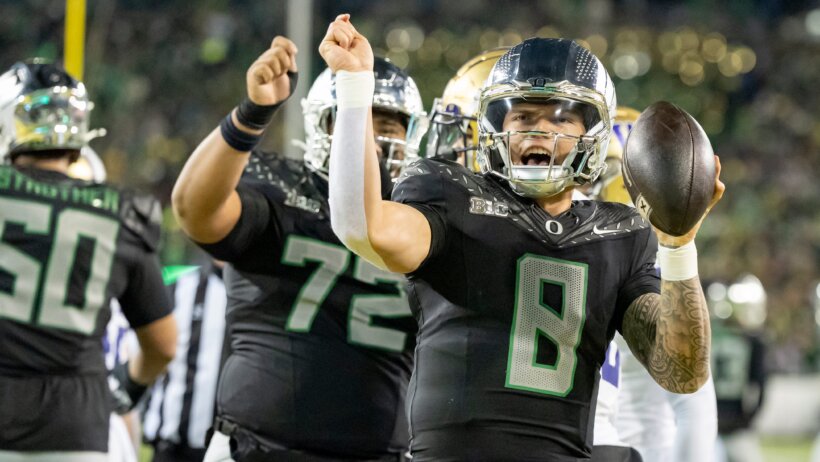 Oregon quarterback Dillon Gabriel dances to celebrate a touchdown