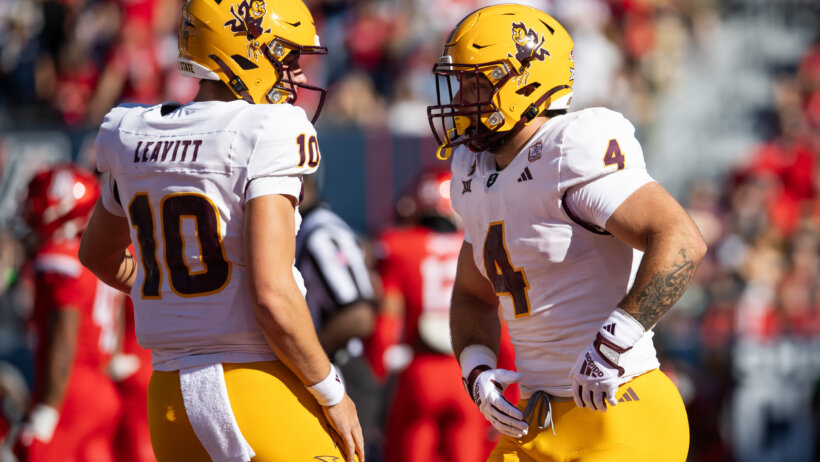 Arizona State Sun Devils running back Cam Skattebo celebrates with quarterback Sam Leavitt