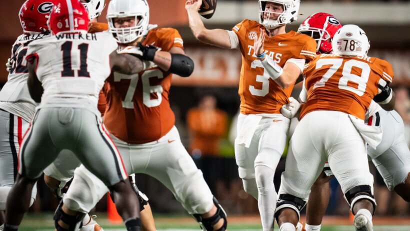 Texas Longhorns quarterback Quinn Ewers throws a pass