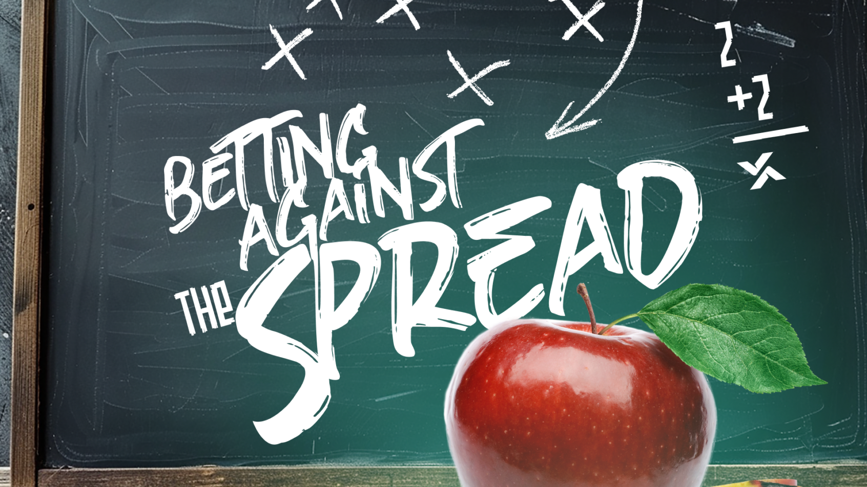 A chalkboard with the words "Betting Against the Spread" scrawled on it.